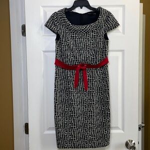 8. Black and white dress with red attached belt